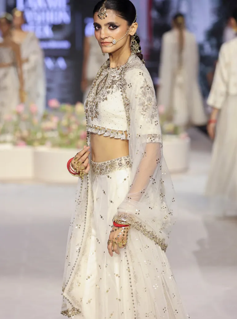 Shakira Off White Embroidered High Low Choli With Sharara And Dupatta Set